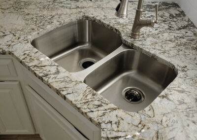 kitchen renovation sink and granite counter tops