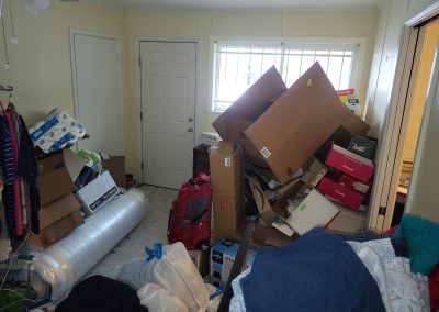 living room before hoarding team cleanup